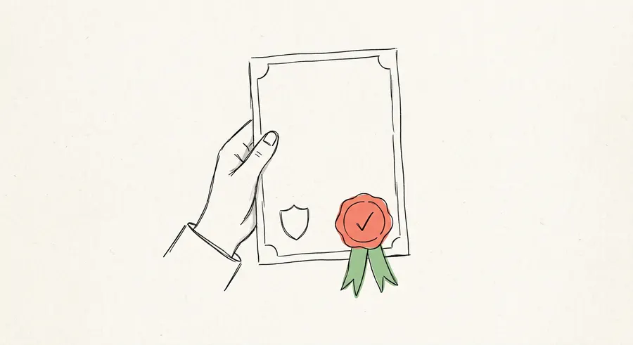 A hand holding up a certificate with a seal and a tick.
